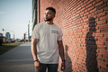Scotch & Bonnet Signature Unisex T-Shirt in sand, front view