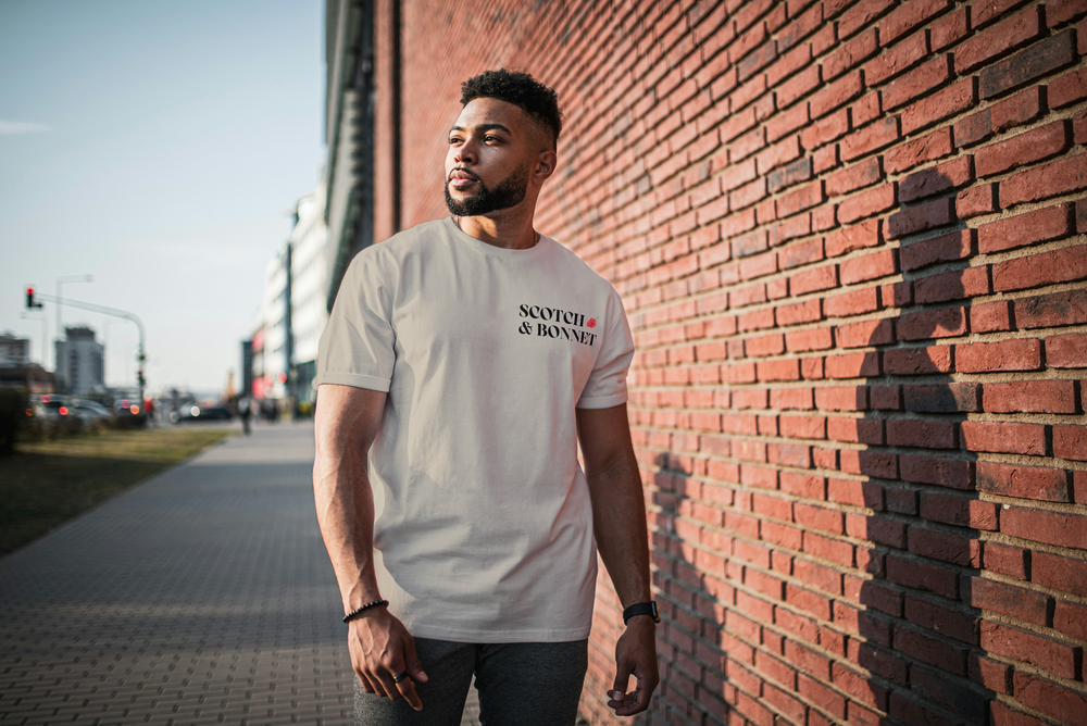 Scotch & Bonnet Signature Unisex T-Shirt in sand, front view